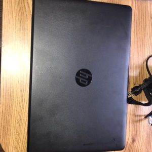 Windows 15 laptop with charger.